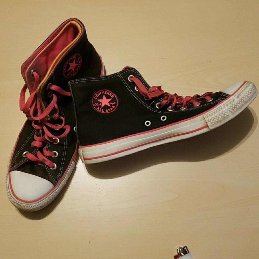Converse high top shoes.